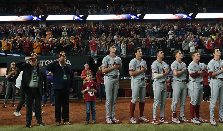 players, Shriners during National Anthem, fans in background